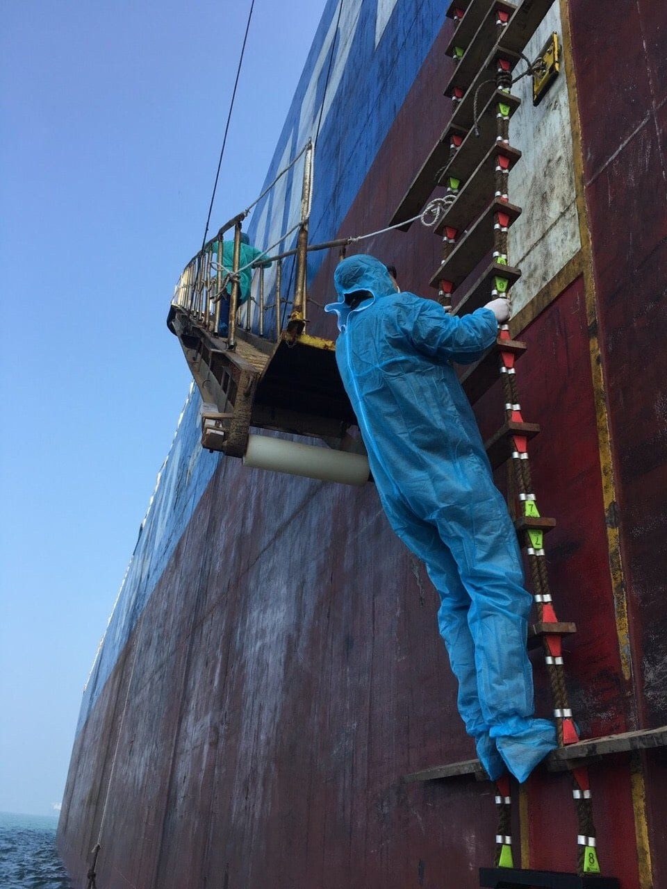 Boarding the vessel in protective clothing