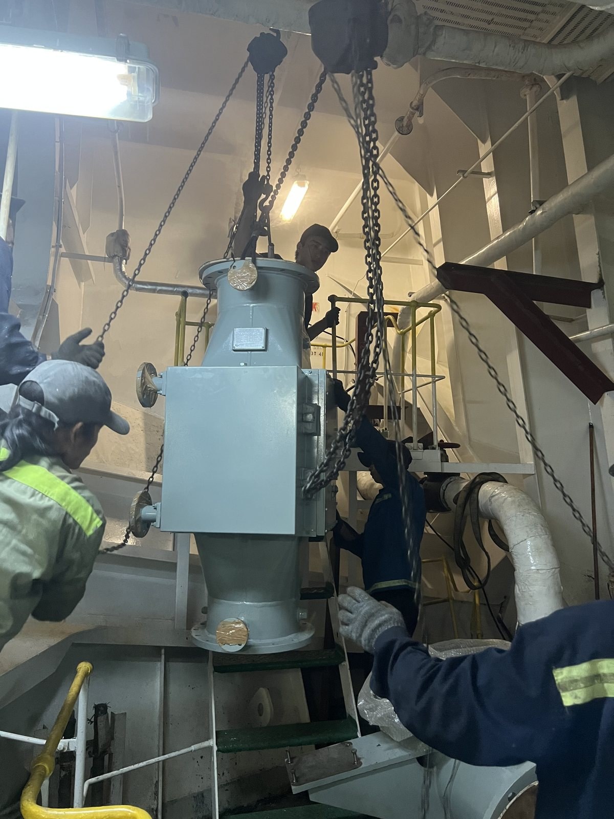 Filter unit lifted into place with chain blocks