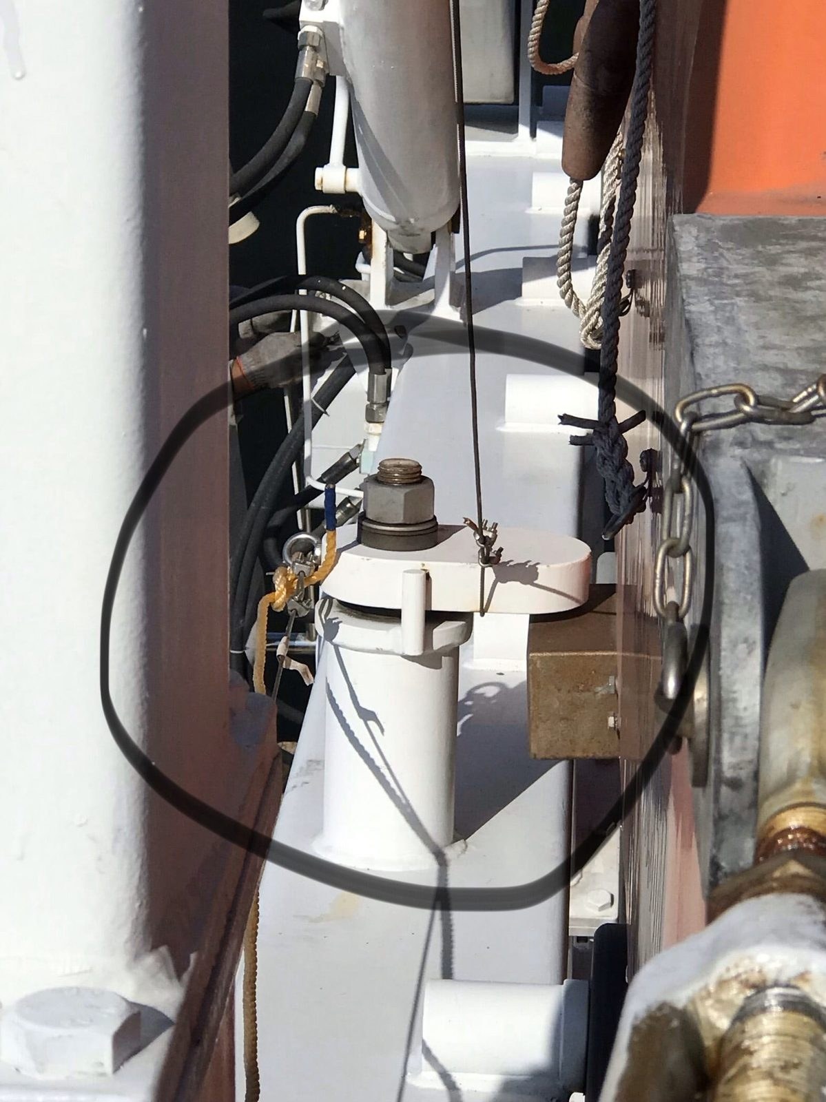 Davit release gear with the inspection point marked