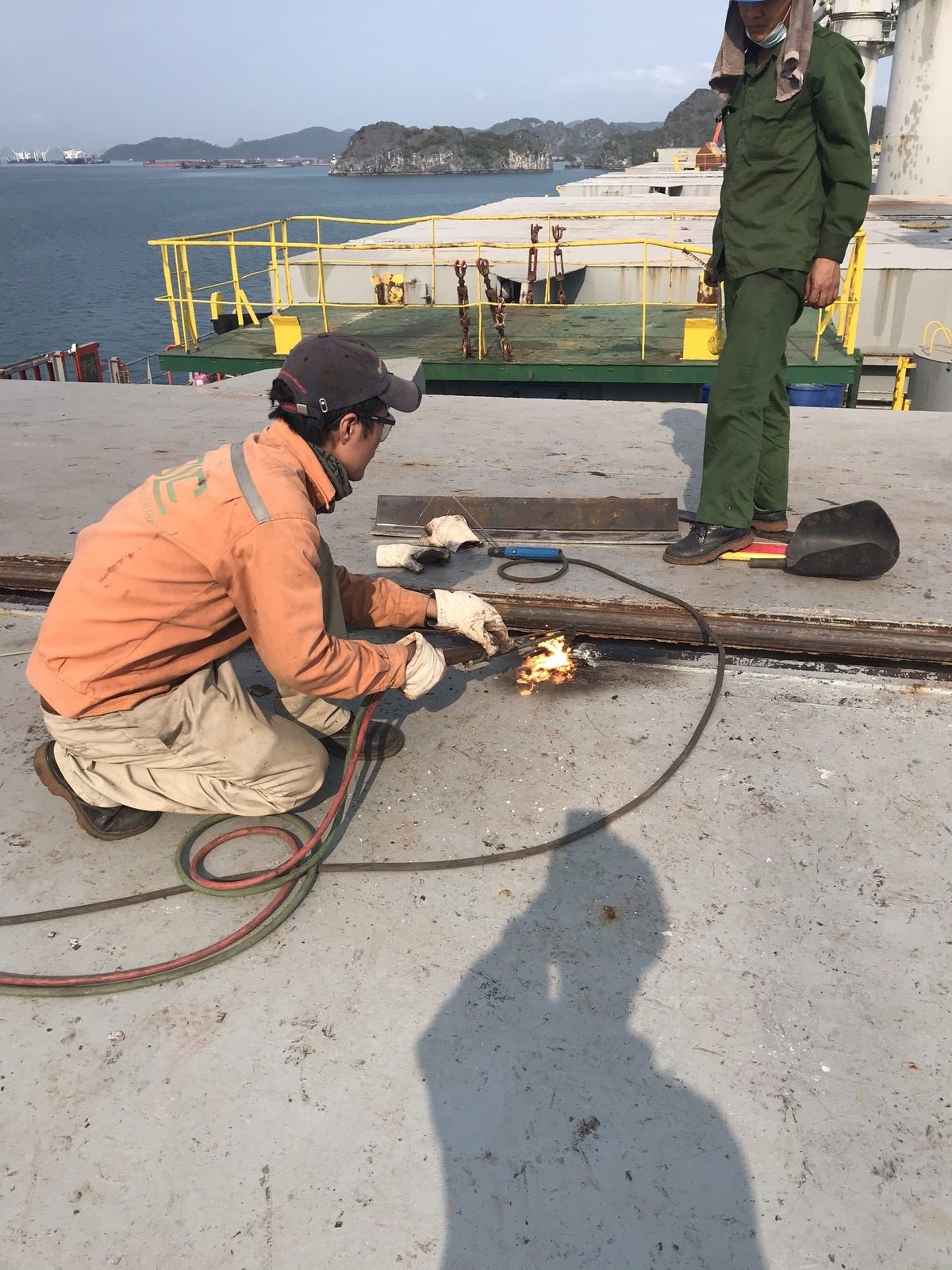 Steel cutting on deck at anchorage