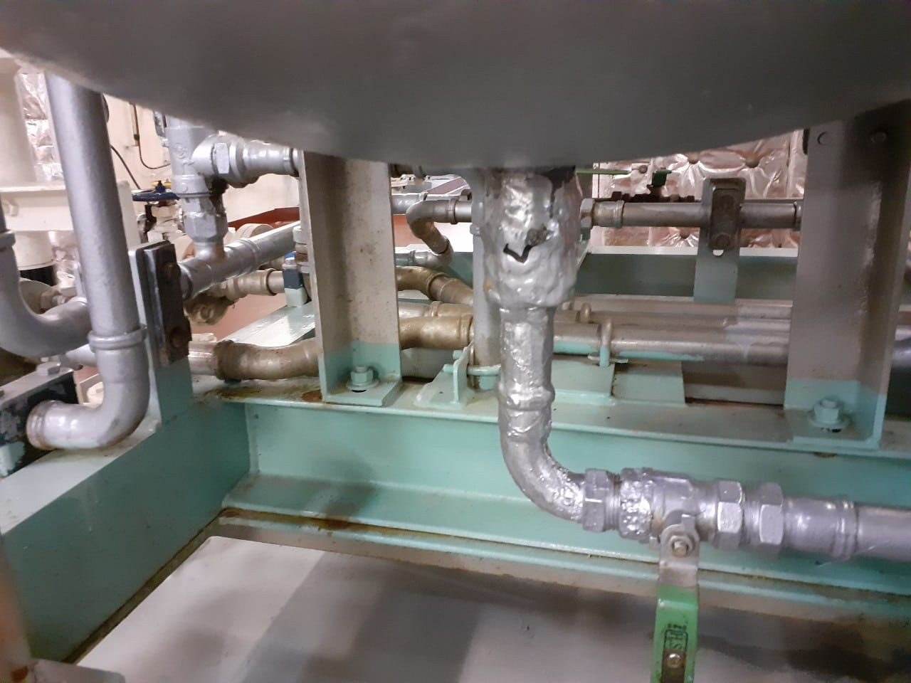 Renewed pipework under an engine room tank