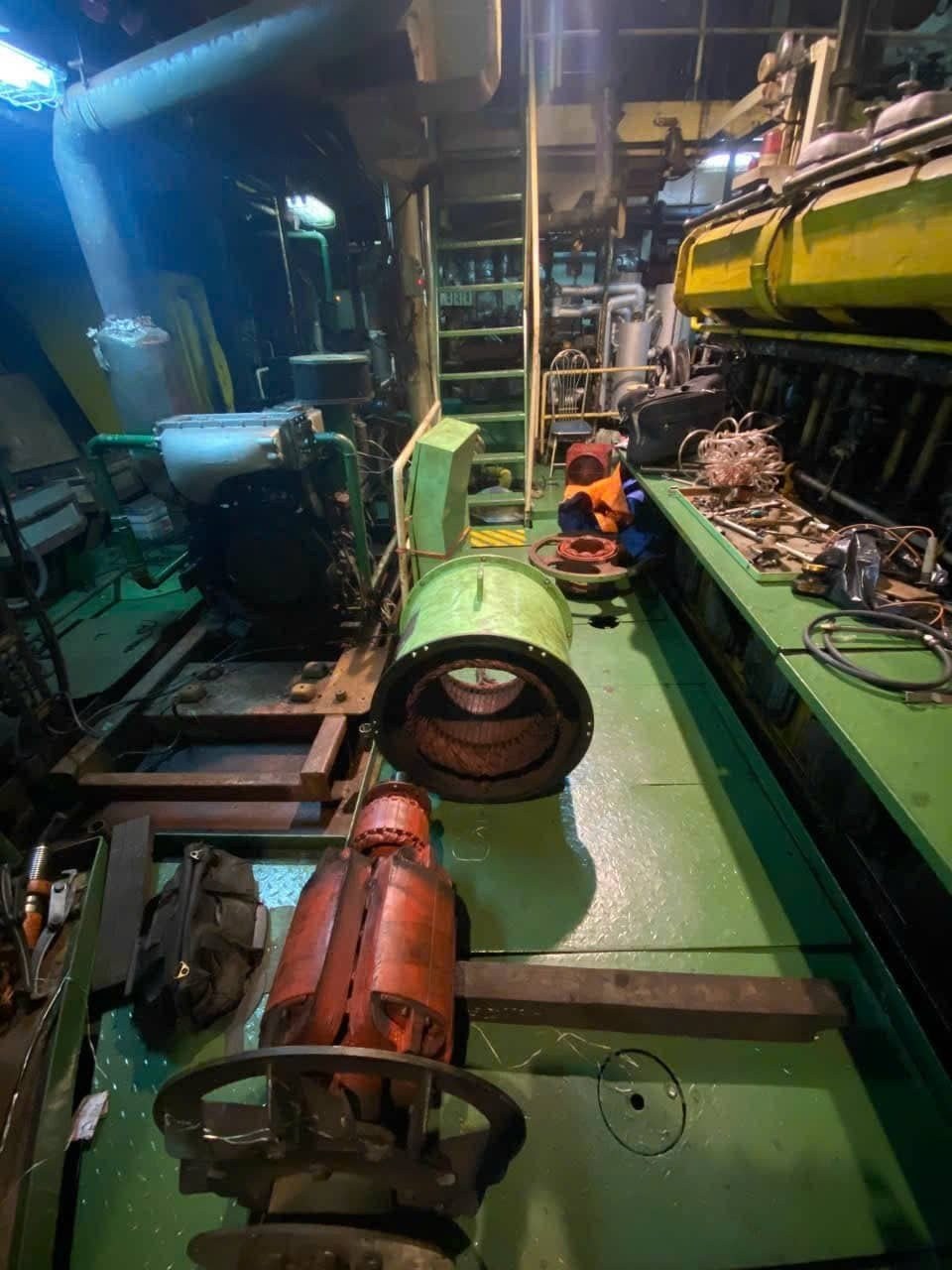 Engine room repair work in port