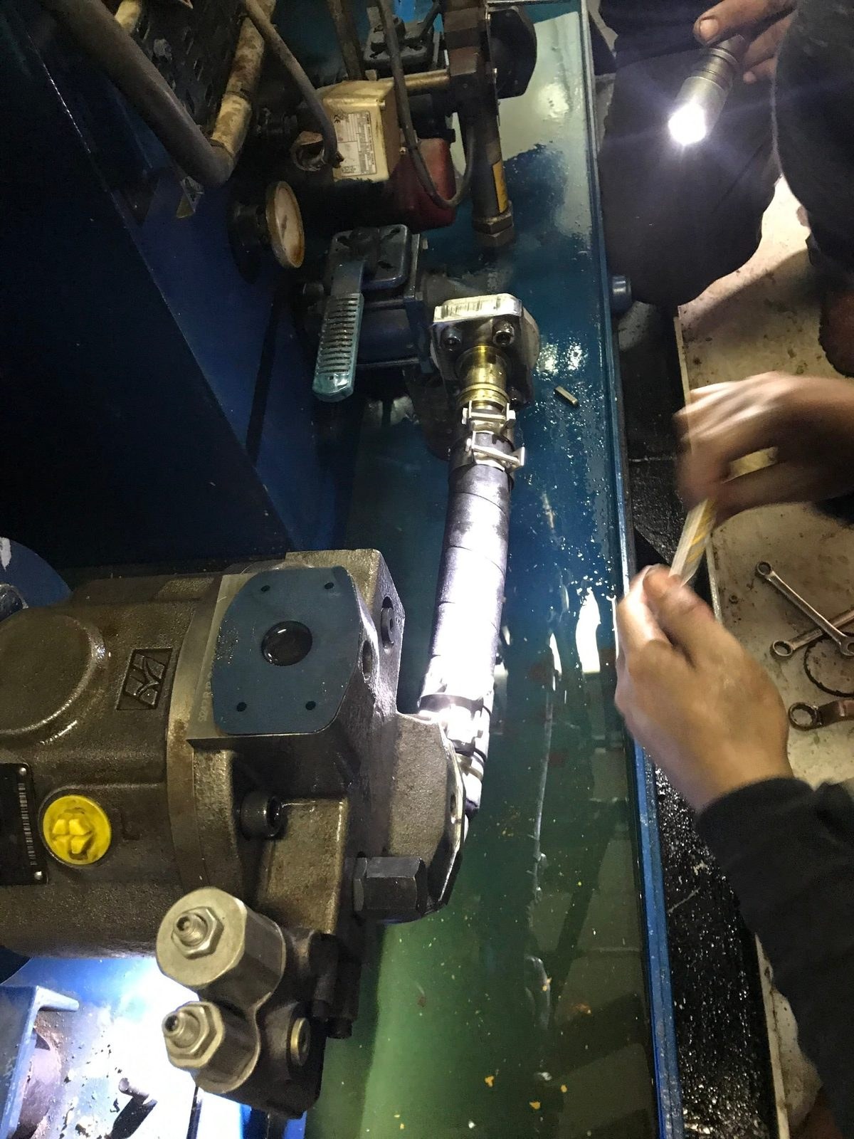 Cargo hold hydraulic pump under repair