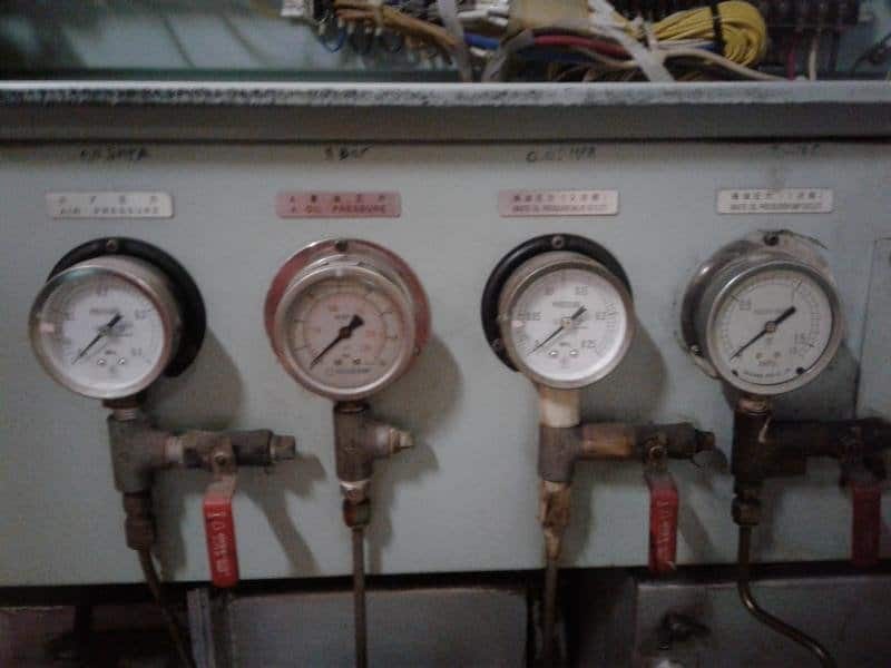 Incinerator control panel pressure gauges during troubleshooting