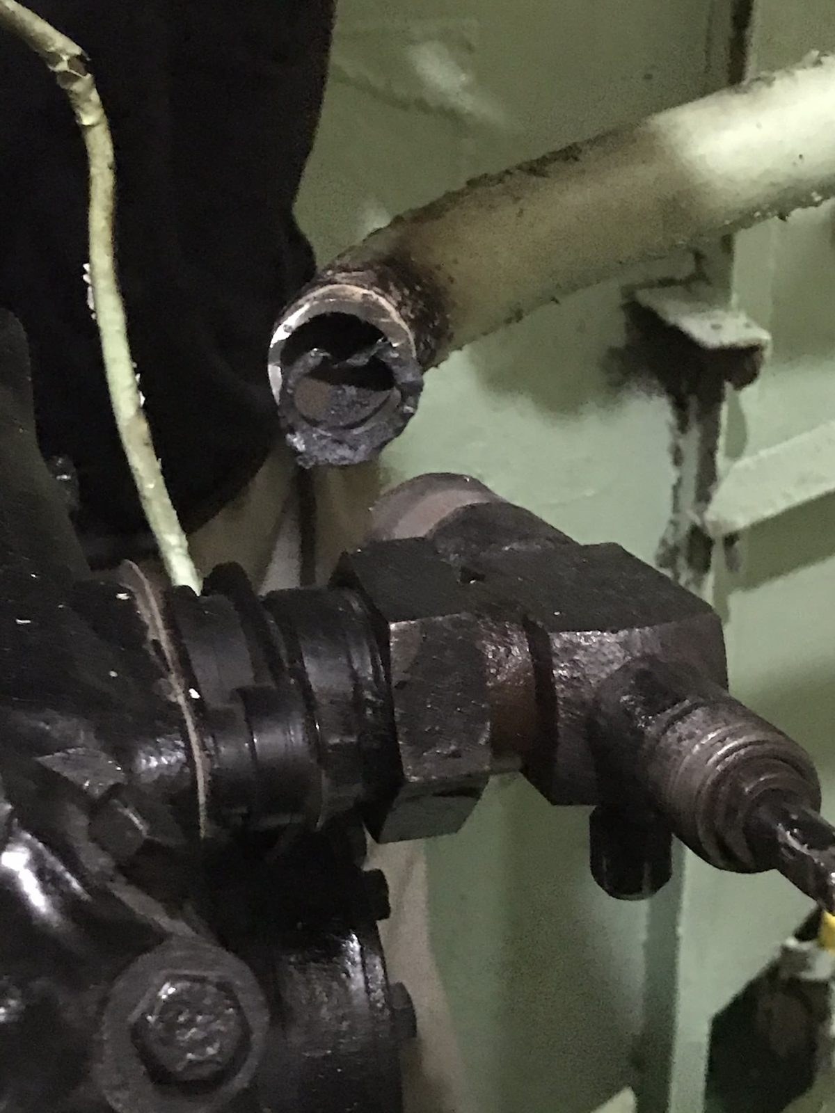 Opened pipe connection during machinery repair