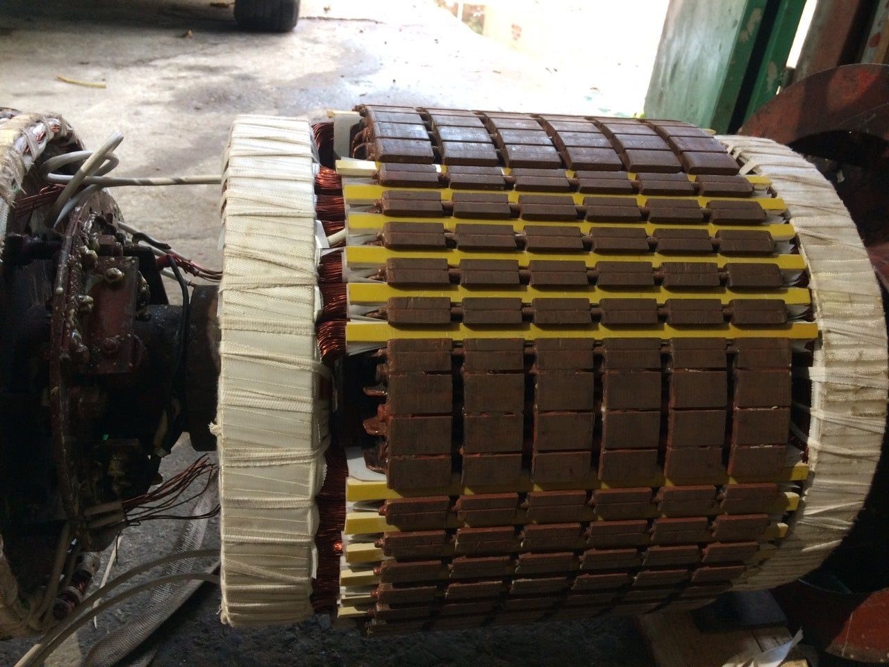 Rewound stator taped before varnishing