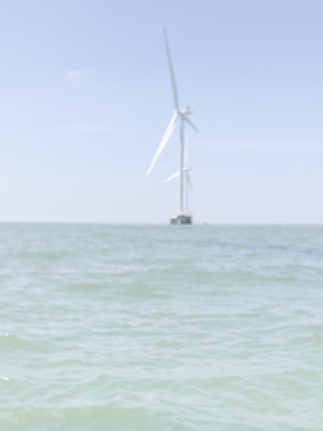 Offshore wind turbine seen from a work boat