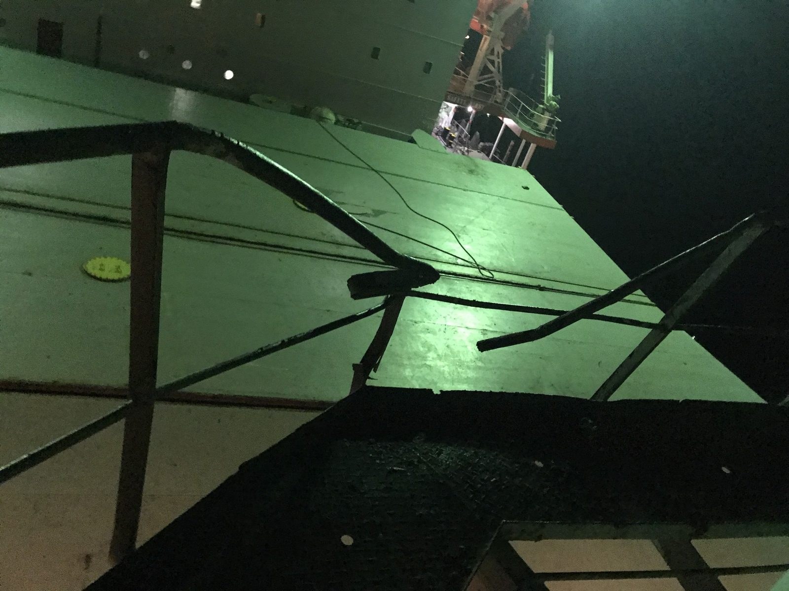Pipe repair area on deck at night