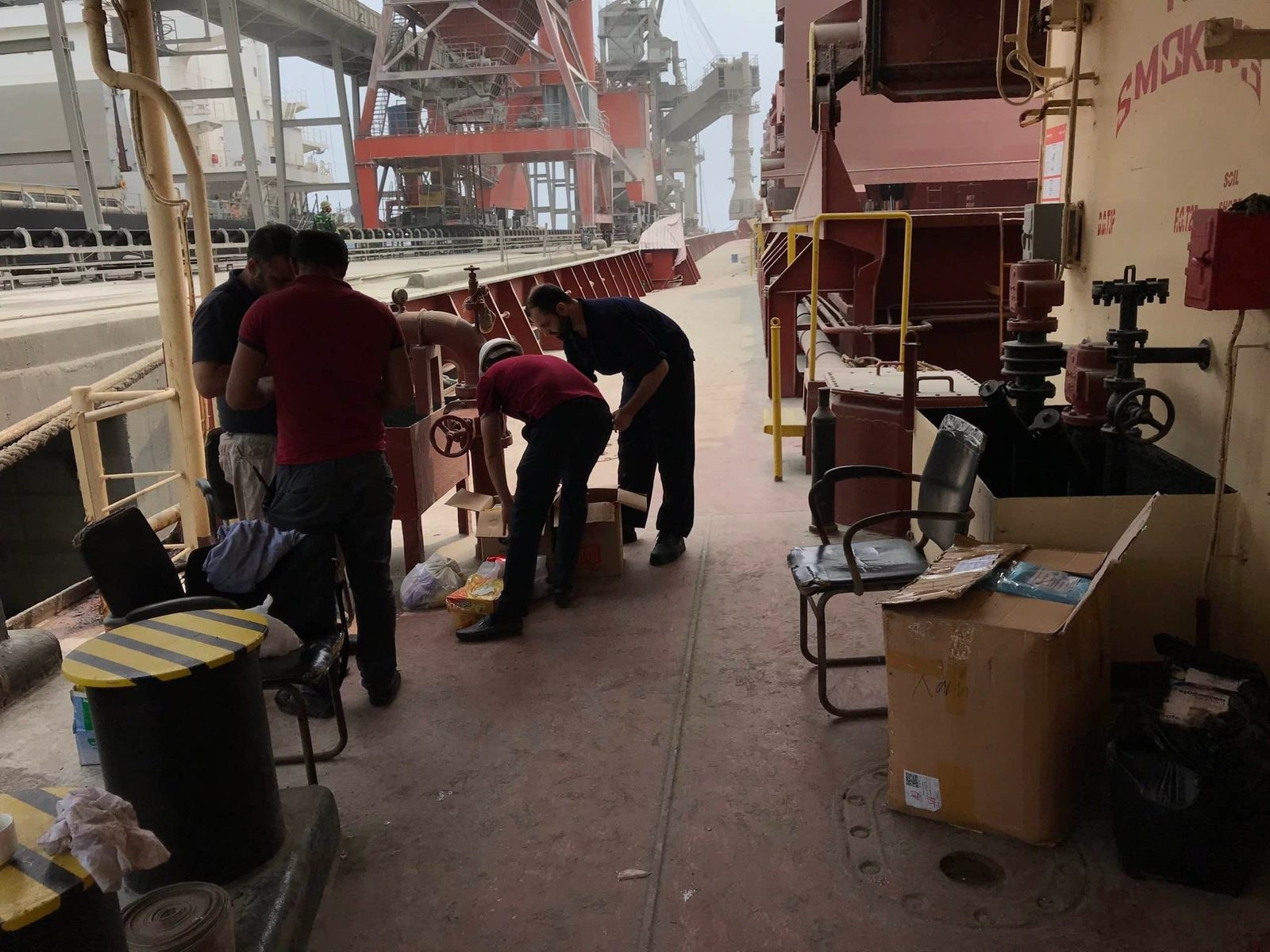 Repair team preparing work on deck