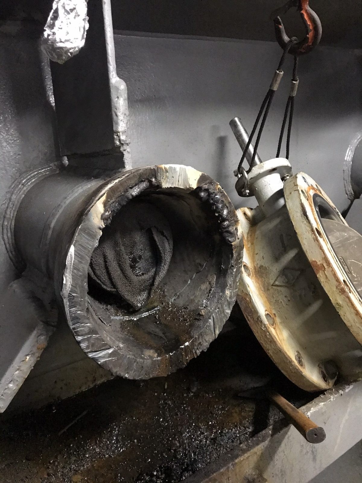 Corroded scrubber spool removed