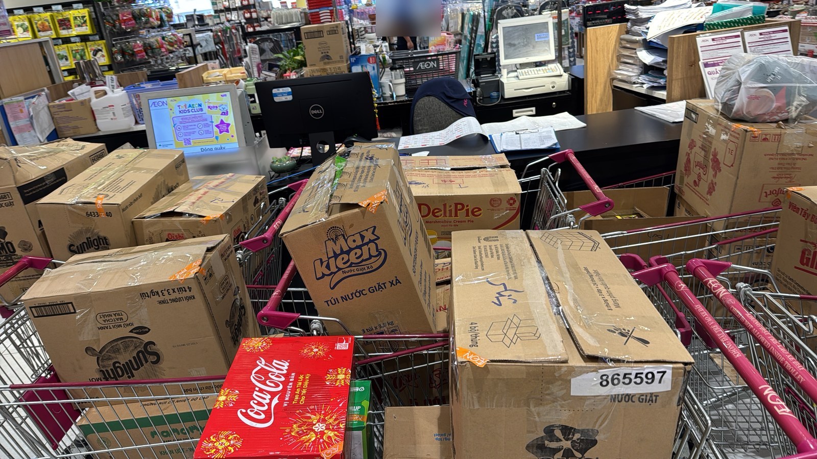 Stores cartons and soft drinks checked out for a vessel order.