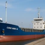 General cargo ship CONG MINH 18 (IMO 9631450) berthed at a Vietnamese port, gearless configuration, delivered on 10 April 2023 to an Iraqi buyer.