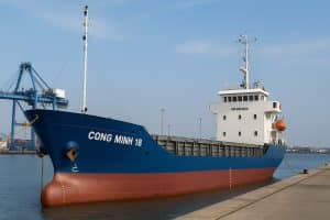 General cargo ship CONG MINH 18 (IMO 9631450) berthed at a Vietnamese port, gearless configuration, delivered on 10 April 2023 to an Iraqi buyer.